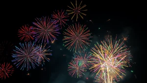 Witness breathtaking diamond fireworks illuminating the night sky with dynamic bursts and vibrant colors.
